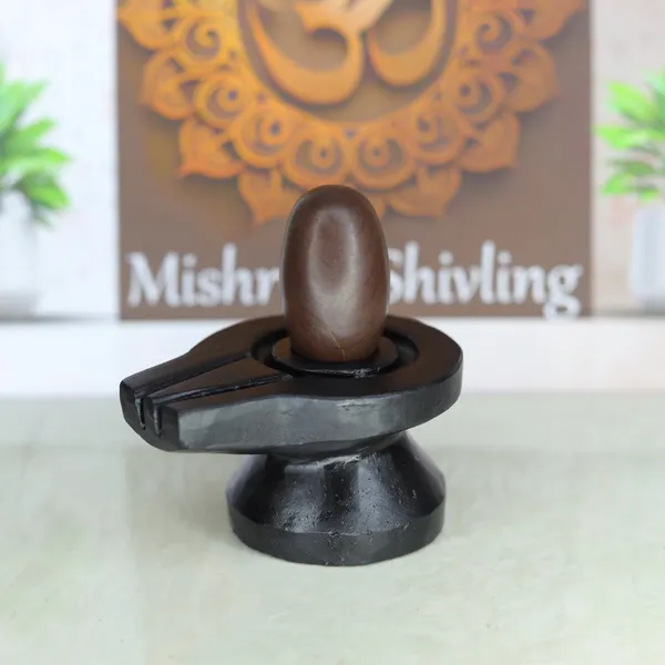 Narmada_Stone_Black_Shivling_With_Damru_Jaladhari_1.5_Inch