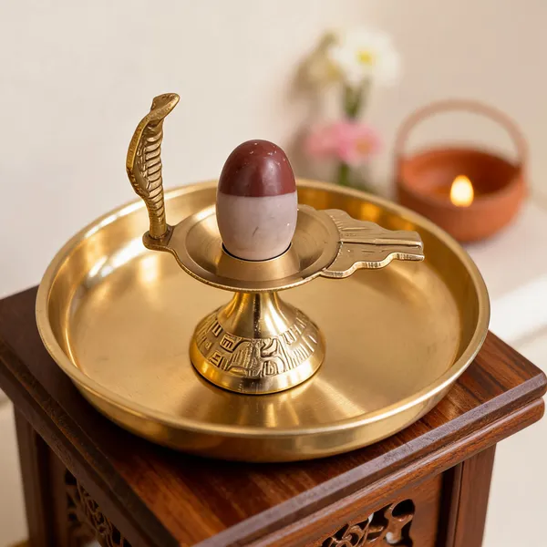 Narmada_Stone_Shivling_With_Brass_Jaladhari_Stand_1.5_Inch