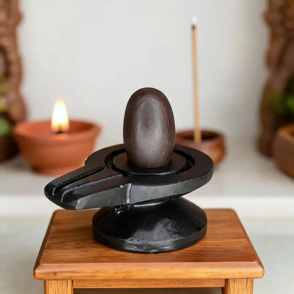 Narmada_Stone_Black_Shivling_With_Damru_Jaladhari_2_Inch