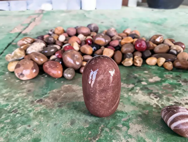 Natural_Narmada_Stone_Brown_Shivling_Idol