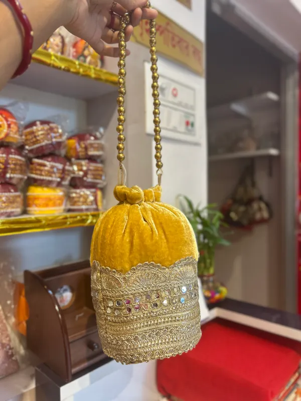 Yellow_Velvet_Embellished_Bridal_Batwa_/_Potli_Bag_for_Women