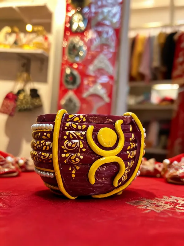 Maroon_Yellow_Wood_Dholak-Style_Kunke_Wedding_Accessory