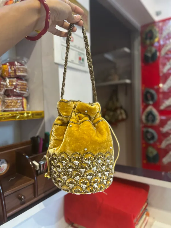 Yellow_Velvet_Embellished_Bridal_Batwa_/_Potli_Bag_for_Women