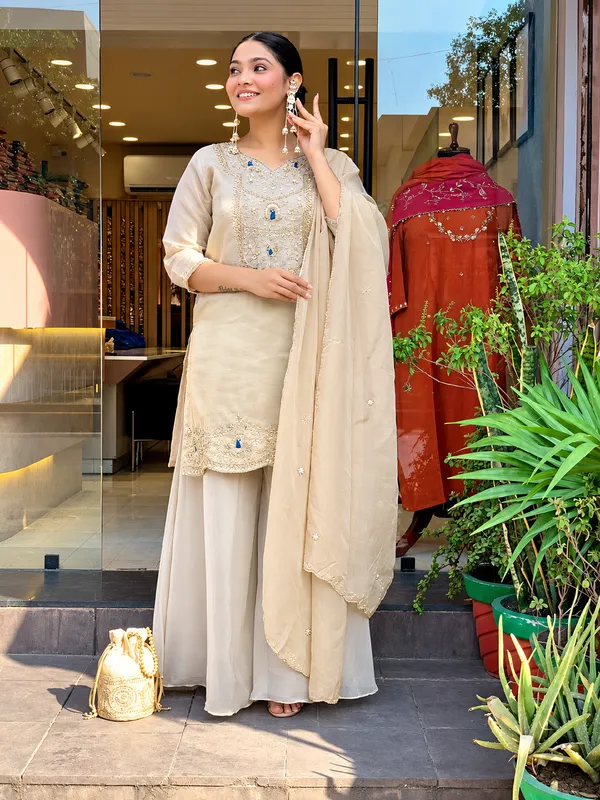 RajvanshiSuit_Women’s_Cream_Silk_Straight_Kurta_with_Heavy_Embroidery_&_Blue_Stone_Detailing