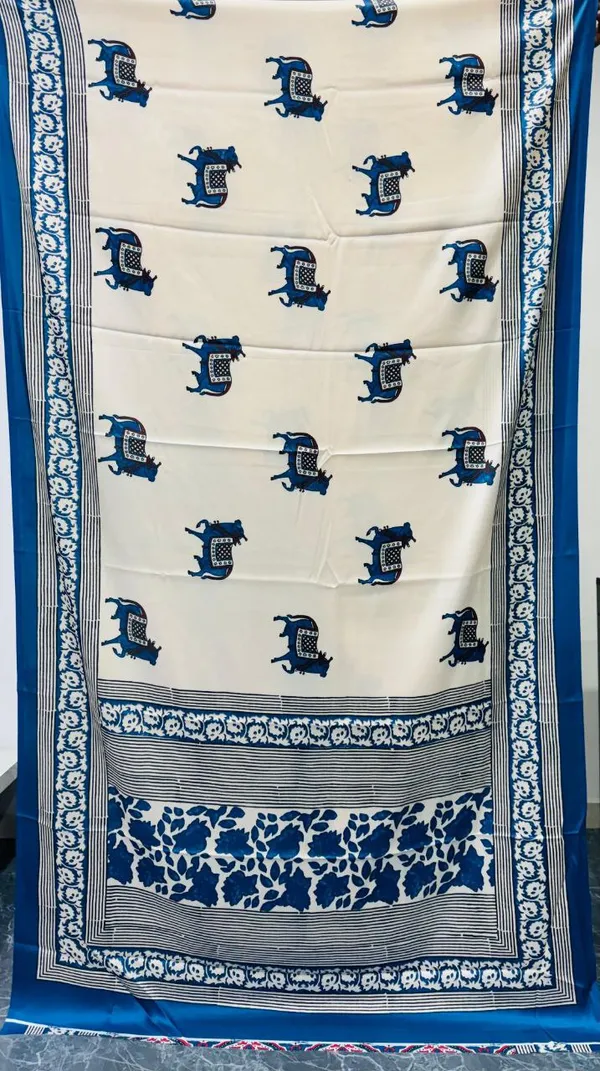 Cream_Blue_Animal_Printed_Ajrakh_Modal_Silk_Saree_With_Traditional_Border