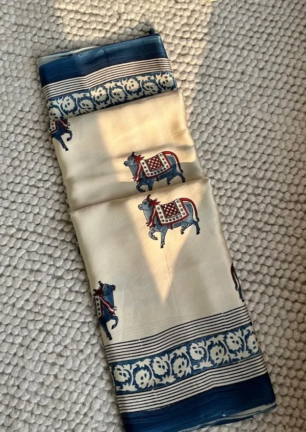 Cream_Blue_Animal_Printed_Ajrakh_Modal_Silk_Saree_With_Traditional_Border
