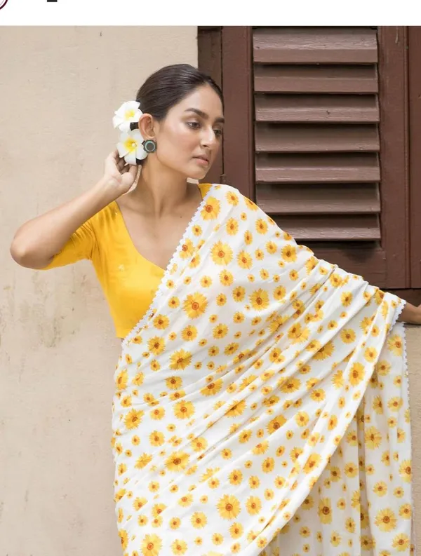 White_And_Yellow_Linen_Saree_With_Sunflower_Print_And_Lace_Border