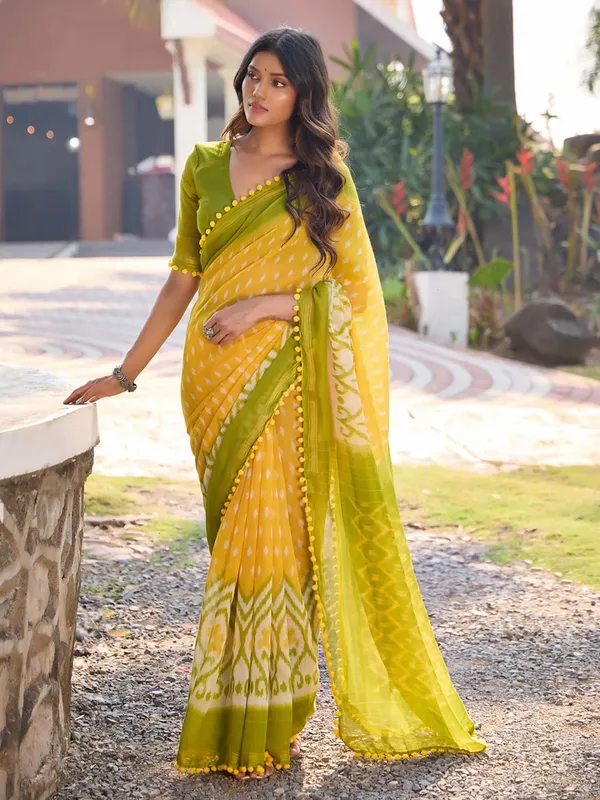 Yellow_And_Olive_Green_Ikat_Print_Saree_With_Pom_Pom_Lace