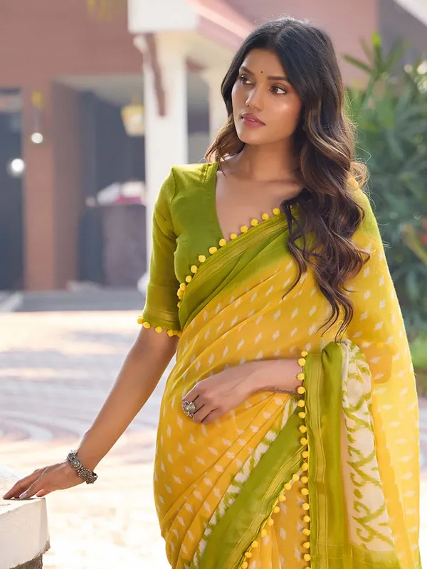 Yellow_And_Olive_Green_Ikat_Print_Saree_With_Pom_Pom_Lace