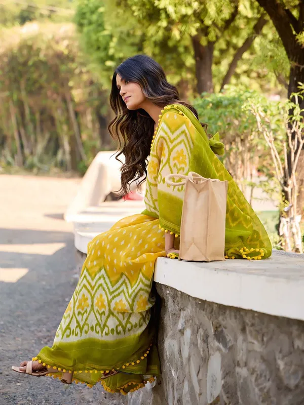 Yellow_And_Olive_Green_Ikat_Print_Saree_With_Pom_Pom_Lace