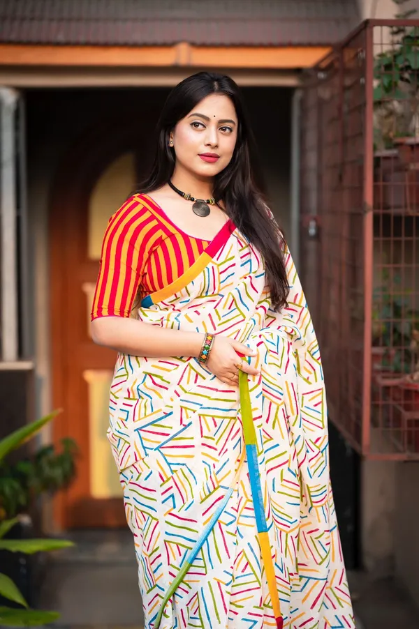 Abstract_Geometric_Print_Saree_With_Striped_Blouse