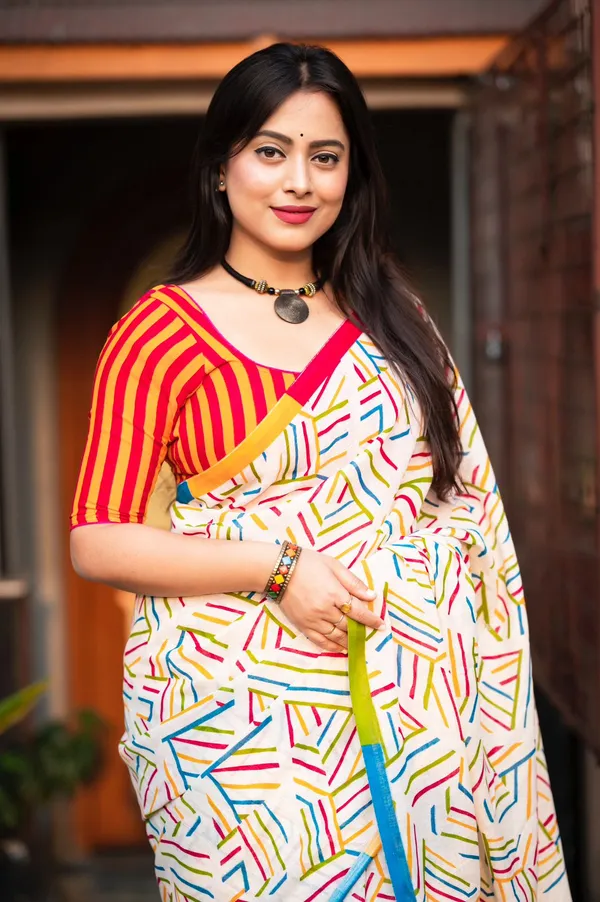 Abstract_Geometric_Print_Saree_With_Striped_Blouse
