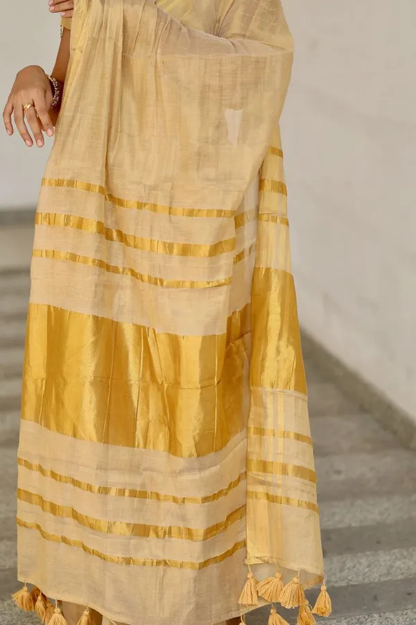 Golden_Beige_Soft_Linen_Saree_With_Zari_Stripes_Tassel_Border