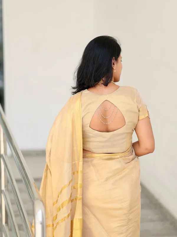 Golden_Beige_Soft_Linen_Saree_With_Zari_Stripes_Tassel_Border