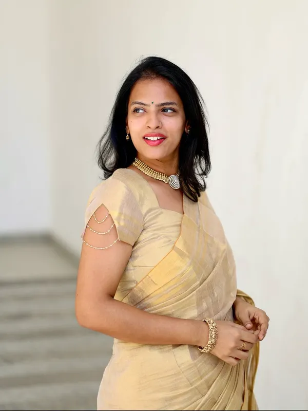 Golden_Beige_Soft_Linen_Saree_With_Zari_Stripes_Tassel_Border