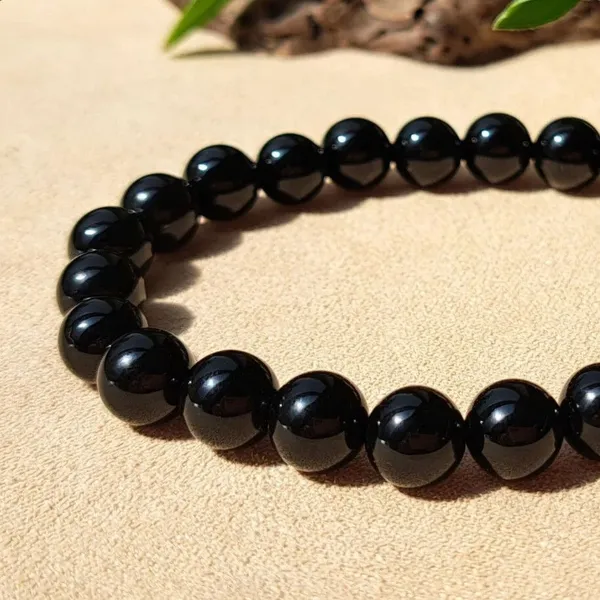 Agatesaura_Crystal,_Black_Obsidian_Beads,_Agate,_Crystal,_Jade,_Quartz_Bracelet_()