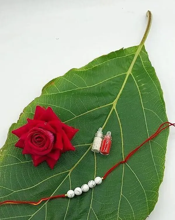 Designer_Howlite_5_Beads_Crystal_Stone_Rakhi|_Rakhi_For_Inner_Calm_and_Focus_Pearl_Rakhi_by_Multiagate_(Real_Gemstone,_Charm_Bracelet,_Crystal_Stone)