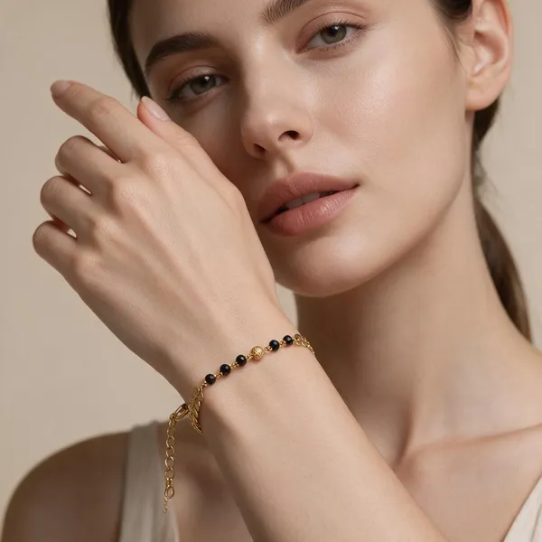 Gold_Tone_Leaf_Design_Black_Beaded_Bracelet
