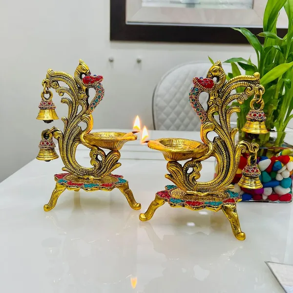 German_Silver_Peacock_Design_Diya_With_Hanging_Bells_Pack_Of_2