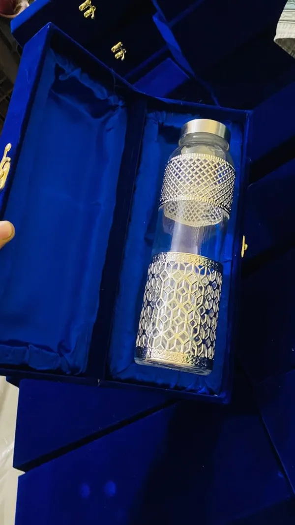 Glass_Diamond_Cut_Serving_Water_Bottle_With_Silver_Finish
