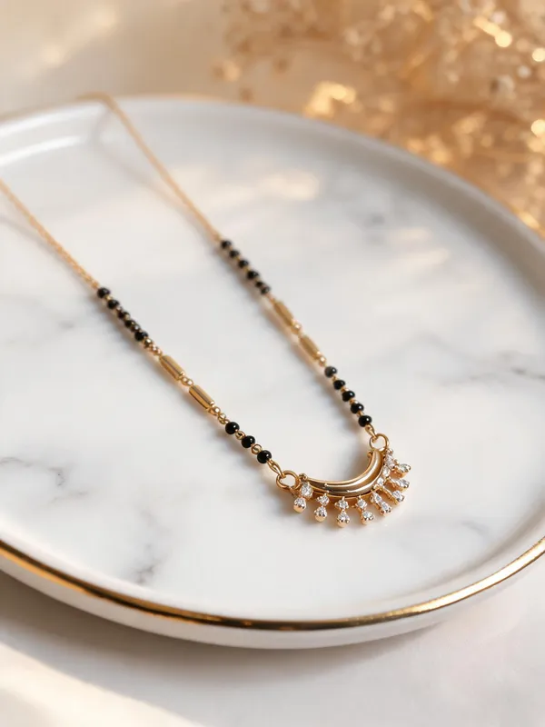 Gold_And_Black_Metal_Beaded_Curved_Pendant_Mangalsutra_For_Women