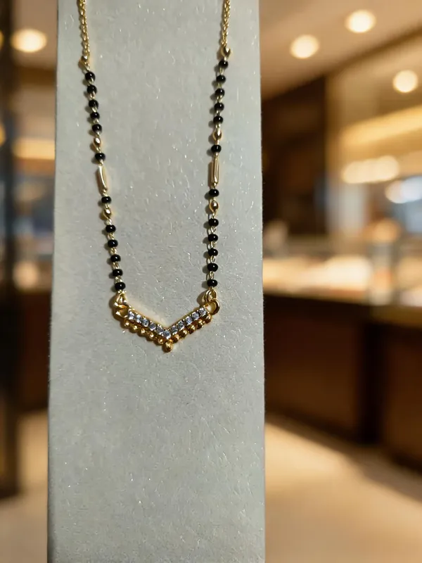 Gold_And_Black_Metal_Beaded_V-Pendant_Mangalsutra_Necklace_For_Women