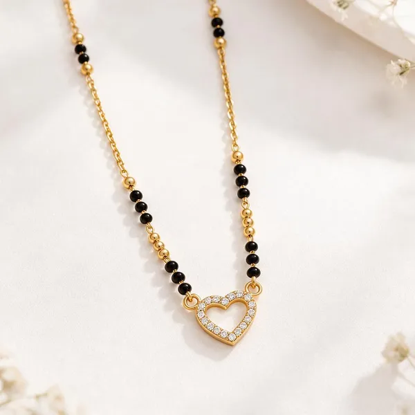 Gold_Black_Metal_Beaded_Heart_Pendant_Mangalsutra_For_Women