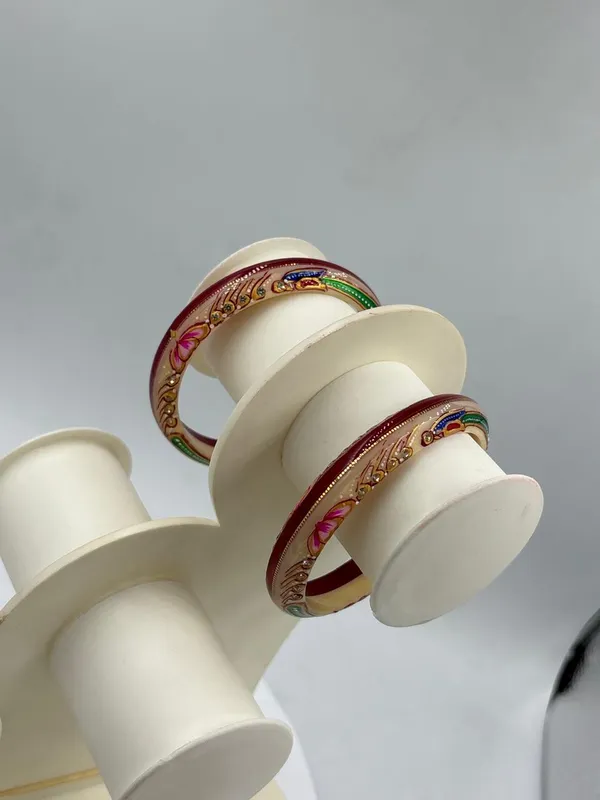 Shreenathji_Gold_Minimalist_Everyday_Traditional_Hand_Painted_22K_Gold_Bound_Red_Cream_Plastic_Base_Bangles_(Pack_Of_2)