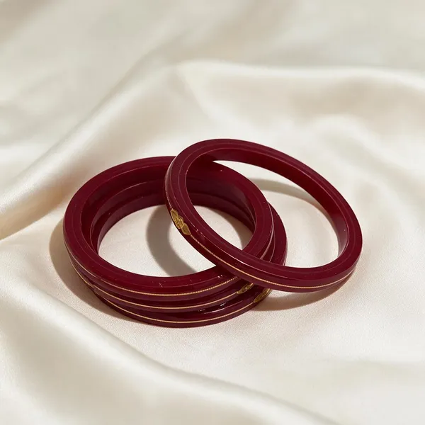Red_22K_Gold_Plastic_Swastik_Churi_Bangle_Set_For_Women_Pack_Of_2