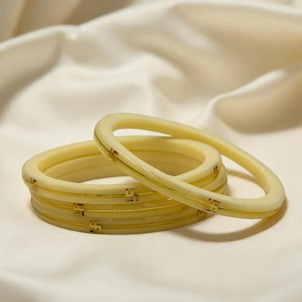 Cream_22K_Gold_Plastic_Swastik_Churi_Bangle_Set_For_Women_Pack_Of_2