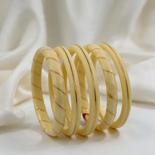 Cream_Gold-Tone_Plastic_Textured_Bangle_Set_For_Women_Pack_Of_6