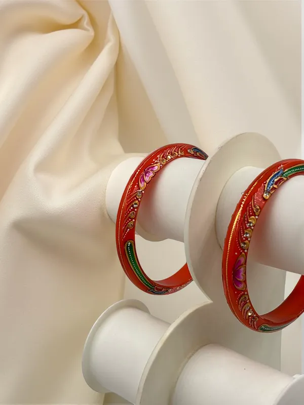Shreenathji_Gold_Minimalist_Everyday_Traditional_Hand_Painted_22K_Gold_Bound_Orange_Plastic_Base_Bangles_(Pack_Of_2)
