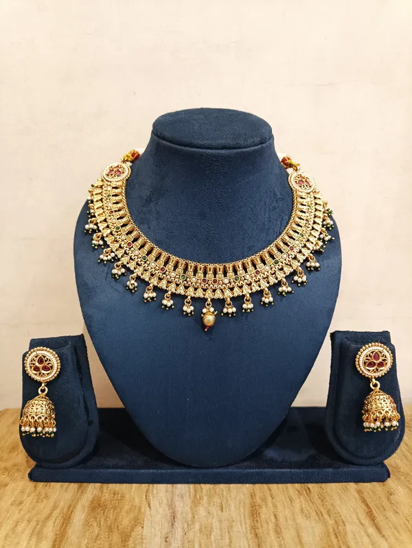 Gold_Brass_Traditional_Necklace_And_Jhumka_Earrings_Set_For_Women