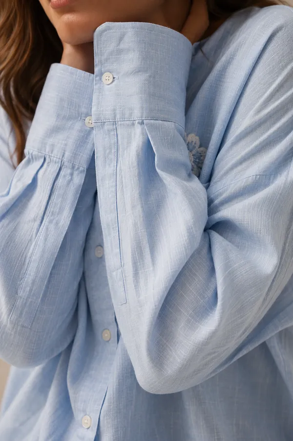 Blue_Linen_Oversized_Daisy_Embroidered_Shirt_For_Women