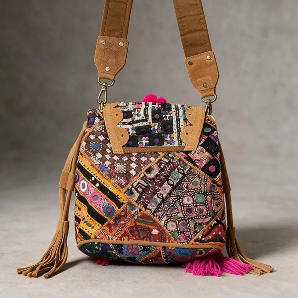 Mustard_Cotton_And_Sued_Leather_Banjara_Potli_Bag_For_Women