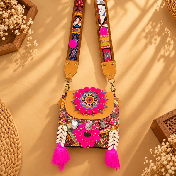 Yellow_Cotton_And_Sued_Leather_Banjara_Potli_Bag_For_Women