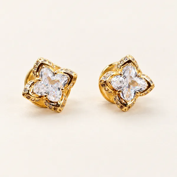 Quatrefoil_stud_earrings_with_clear_centres_|_Clear_/_gold_tone
