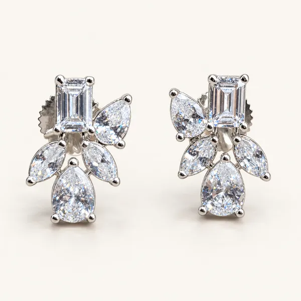 Mixed-cut_five-stone_earrings_with_pear-shaped_drops_|_Clear_/_silver_tone