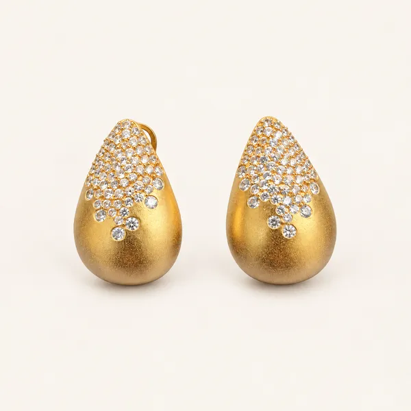 Teardrop_stud_earrings_with_clear_stone_detailing_|_Gold_tone_/_clear
