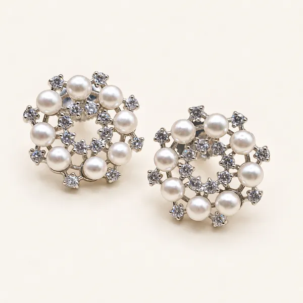 Open-circle_stud_earrings_with_alternating_pearls_and_clear_stones_|_White_/_clear_/_silver_tone