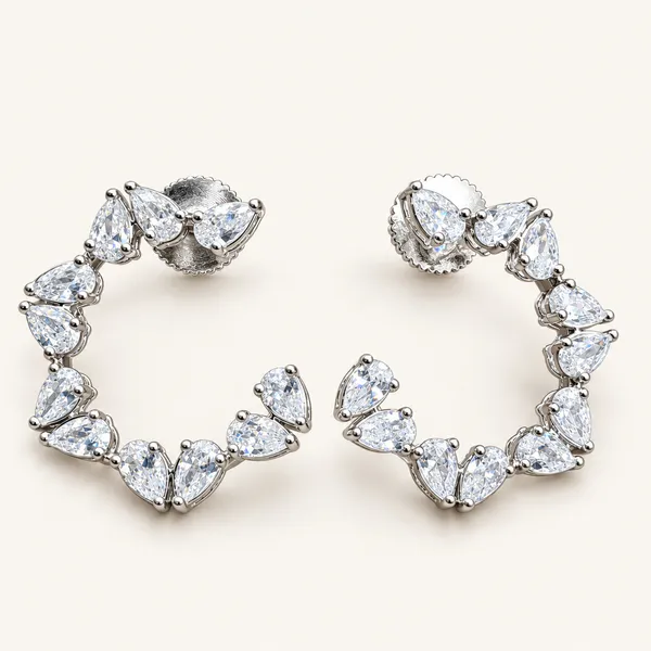Open-circle_earrings_with_pear-shaped_stones_|_Clear_/_silver_tone