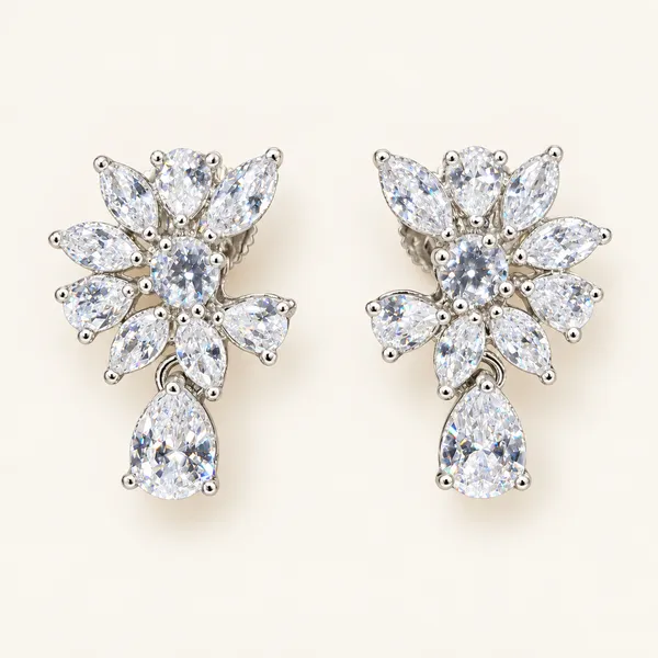 Floral_spray_earrings_with_pear-shaped_drops_|_Clear_/_silver_tone