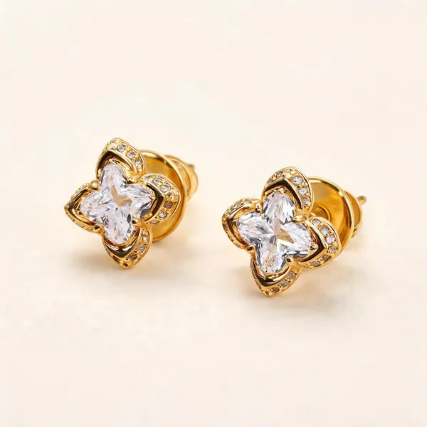 Quatrefoil_Stud_Earrings_With_Clear_Centres_|_Clear_/_Gold_Tone
