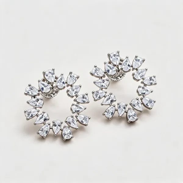 Oval_Wreath_Stud_Earrings_With_Pear-Shaped_Stones_And_Crown_Detail_|_Clear_/_Silver_Tone