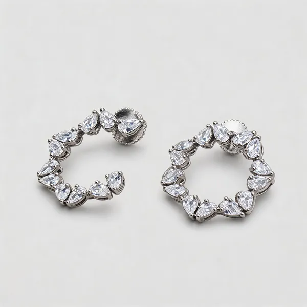 Open-Circle_Earrings_With_Pear-Shaped_Stones_|_Clear_/_Silver_Tone