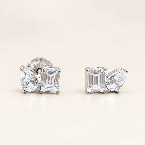 Two-stone_stud_earrings_with_pear_and_rectangular_stones_|_Clear_/_silver_tone