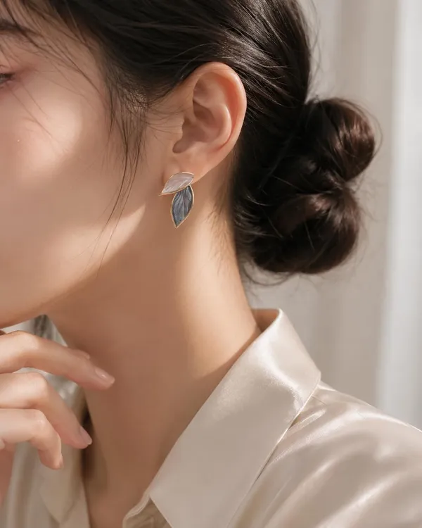 D_Glamm_Fashion_Dual_Leaf_Stud_Earrings_With_Mother_Of_Pearl_And_Gold_Trim