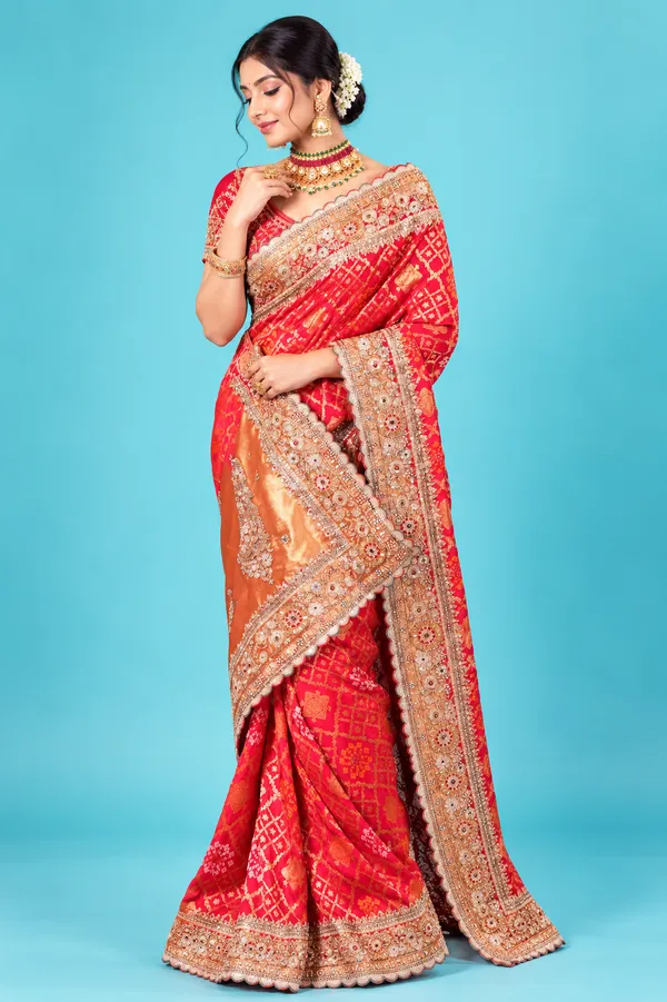 Elegant_Red_Orange_Designer_Saree_With_Heavy_Embroidered_Border_Red