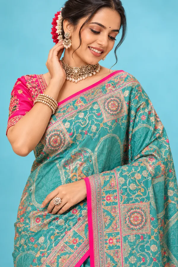 Elegant_Turquoise_Blue_Designer_Saree_With_Golden_Traditional_Motifs_Rich_Pink_Border_Turquoise_Blue