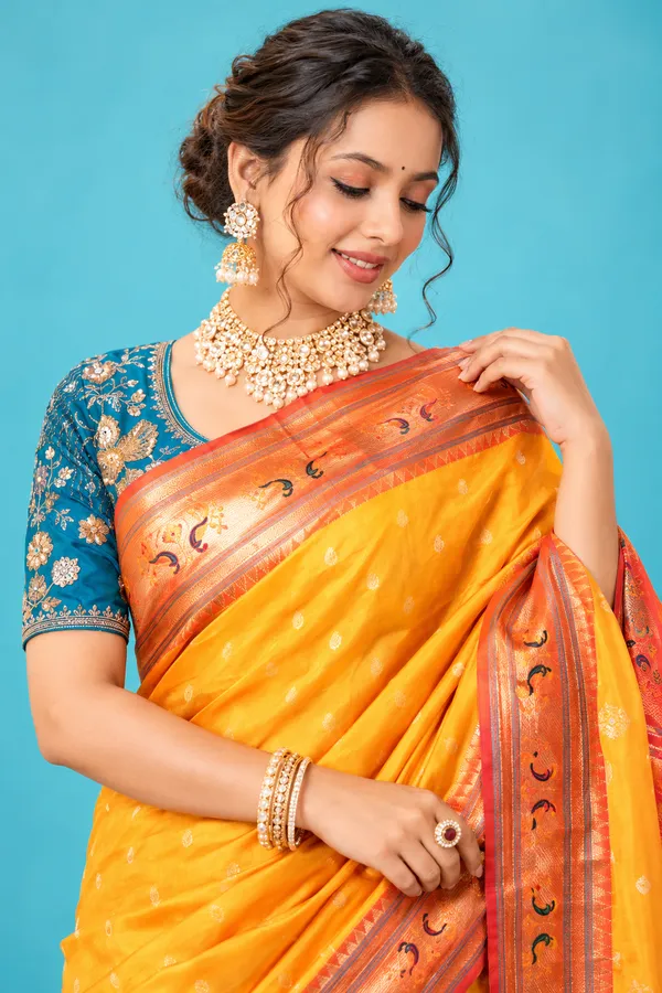 Royal_Golden_Yellow_Designer_Saree_With_Orange_Traditional_Border_Rich_Printed_Pallu_Yellow